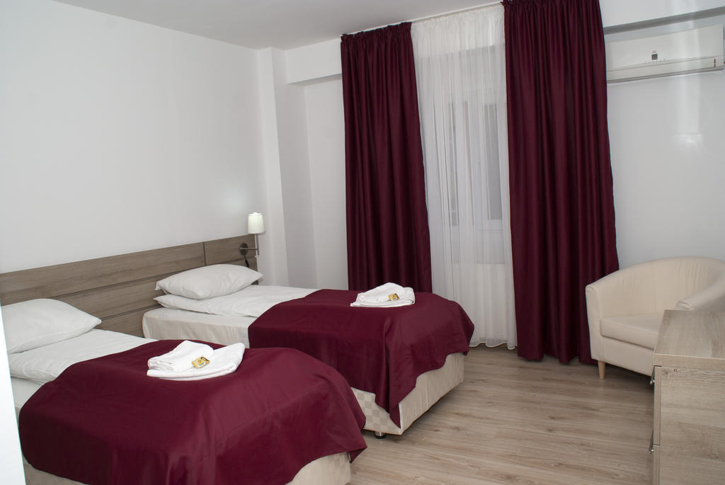 Hotel Otopeni Pokoj fotografie